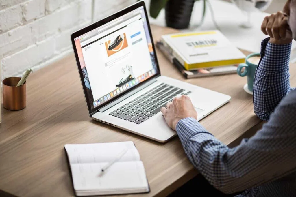 How to Create the Perfect UI and UX for Your Website 2 Person using laptop computer