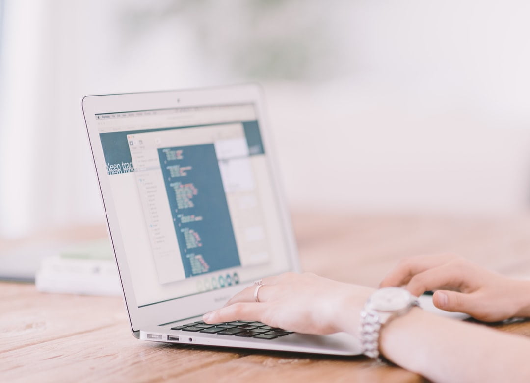 Are You Considering a UX Degree? Here's What You Need to Know! 1 Person using a laptop